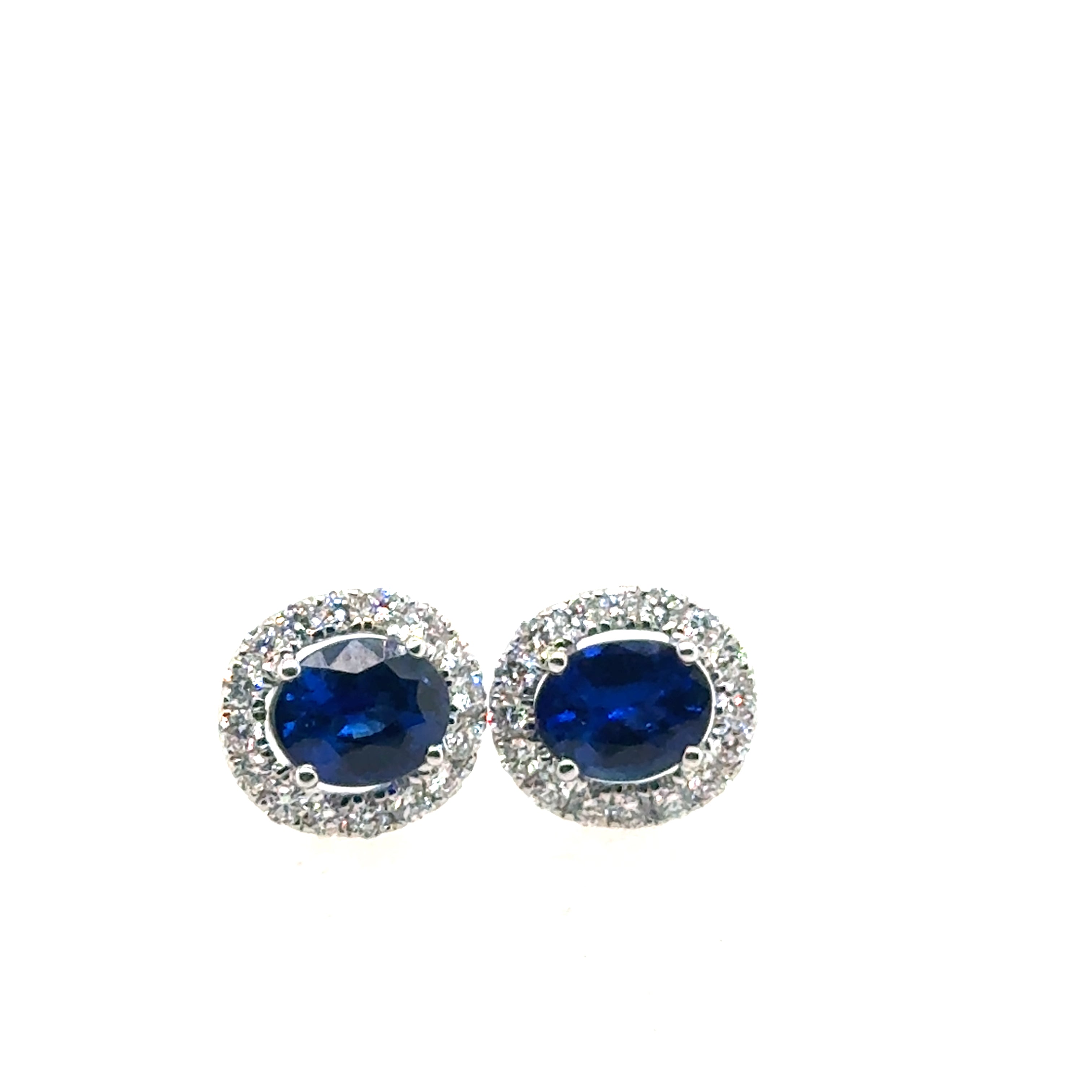 Lady's White 18 Karat Earrings With 2 = 1.49Tw Oval Sapphires And 32 = 0.36Tw Round G/H Si1 Diamonds